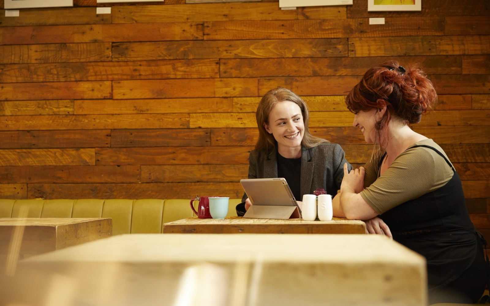 Samantha meeting a client over coffee
